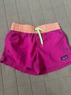 Patagonia girl’s Magenta Athletic Shorts with Peach Waistband